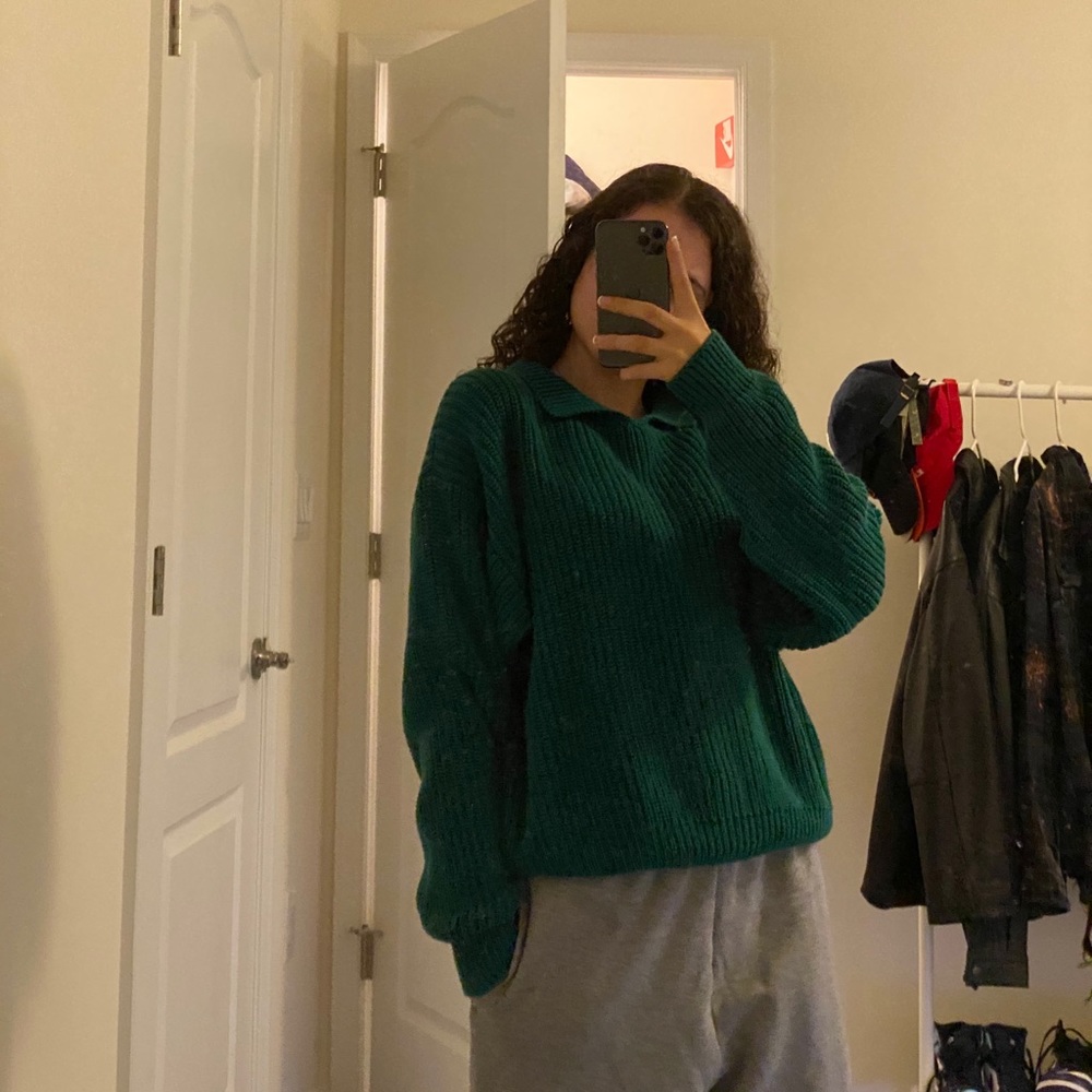 green knitted grandpa sweater